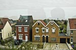 Suburban homes of Antwerp from the train.
