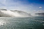The American Falls to the left and the Horseshoe Falls in the background from the Maid of the Mist.